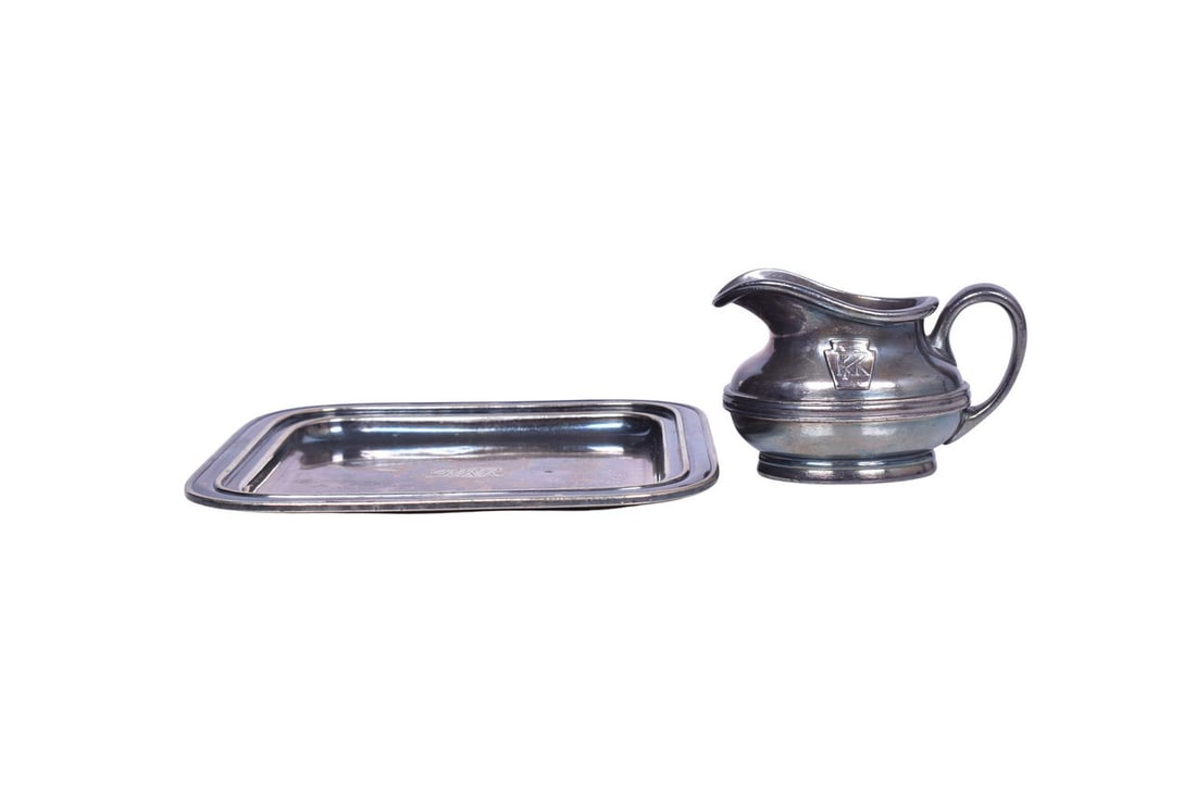 Two pieces of dining car silver for the Pennsylvania Railroad. Includes a 2 1/2" tall creamer, side (1 of 4)