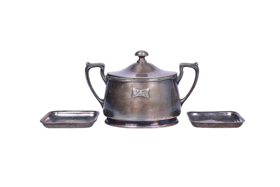 Three pieces of dining car silver for the Nashville Chattanooga & St. Louis Railway. Includes a (1 of 5)