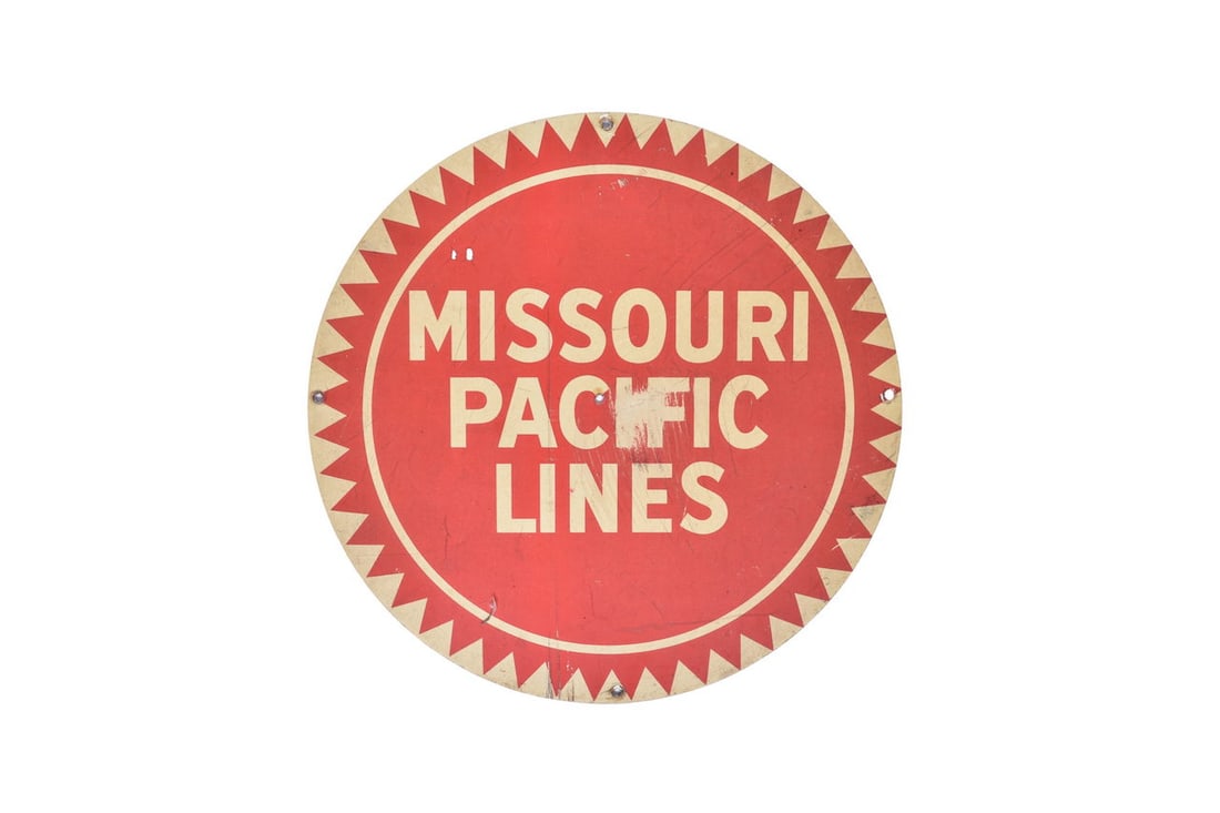 18" diameter reflective sign with Missouri Pacific Lines on the front. Moderate wear to the right