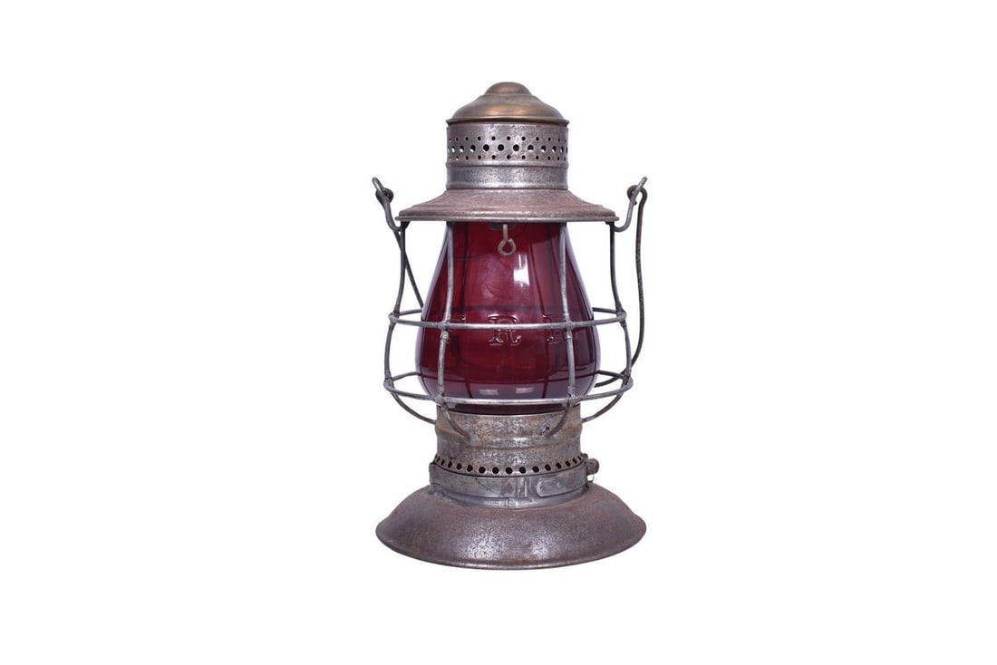Brass top bell bottom lantern with FITCHBURG embossed on the shoulder. Frame has mild rust and a (1 of 8)