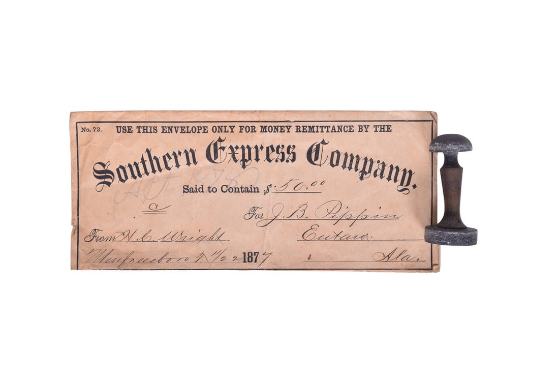 Metal wax sealer reading Southern Ex. Co. Brockton, Ala. 4380. Mild white stain / tarnish around