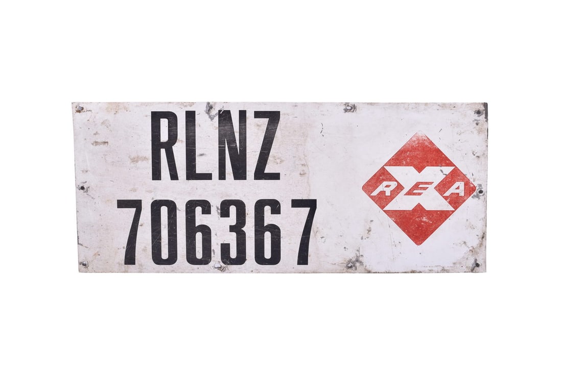 24" by 10" aluminum Railway Express Agency sign for piggyback trailers. Sign is numbered RLNZ 706367 (1 of 2)