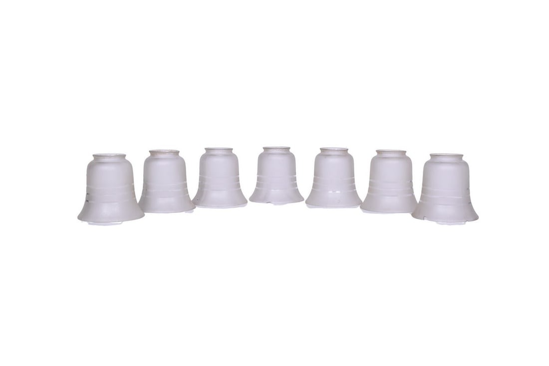 Seven decorative frosted glass light shades from Pullman cars. Each measures roughly 4 1/8" tall by: Seven decorative frosted glass light shades from Pullman cars. Each measures roughly 4 1/8" tall by 4 3/8" diameter. One has a small chip off the edge, the rest are in good condition. Please see photo
