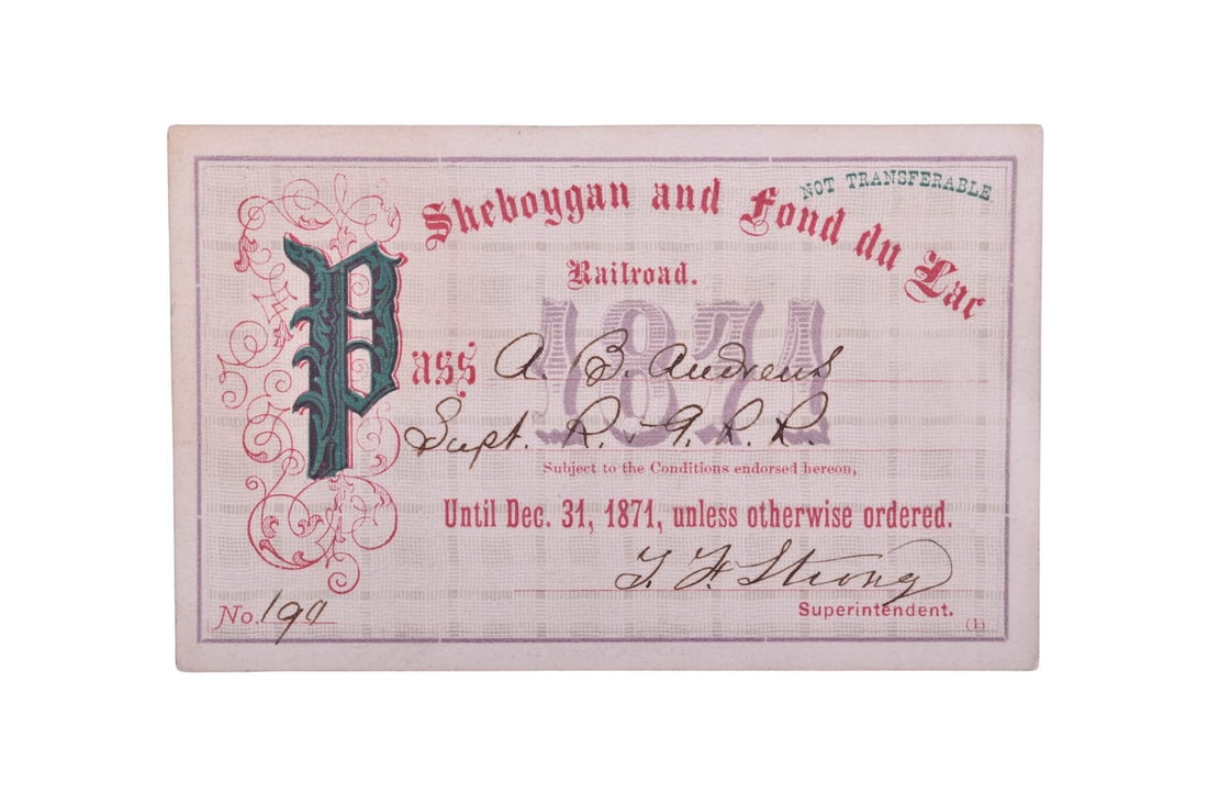 An 1871 annual pass for the Sheboygan and Fond du Lac Railroad, numbered 190, issued to A.B.: An 1871 annual pass for the Sheboygan and Fond du Lac Railroad, numbered 190, issued to A.B. Andrews, and signed by Superintendent T.F. Strong. Front has an ornate design with a subtle plaid backgroun