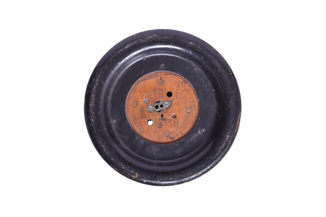 A wooden foundry wheel mold for casting locomotive wheels. Several pattern numbers are present: A wooden foundry wheel mold for casting locomotive wheels. Several pattern numbers are present including Z2883, Z3709, Z6387, and Z6388. The reverse side shows the number 6388. One side is about 12" i