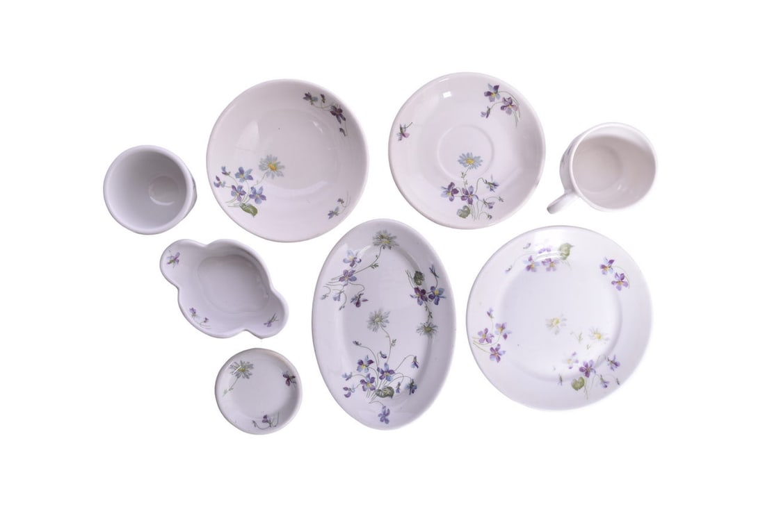 Seven pieces of Chicago, Burlington & Quincy Railroad dining car china in the Violets &: Seven pieces of Chicago, Burlington & Quincy Railroad dining car china in the Violets & Daisies pattern. One 8½" x 5¾" Oval Platter by Buffalo China, back stamped CB&QRR., sh