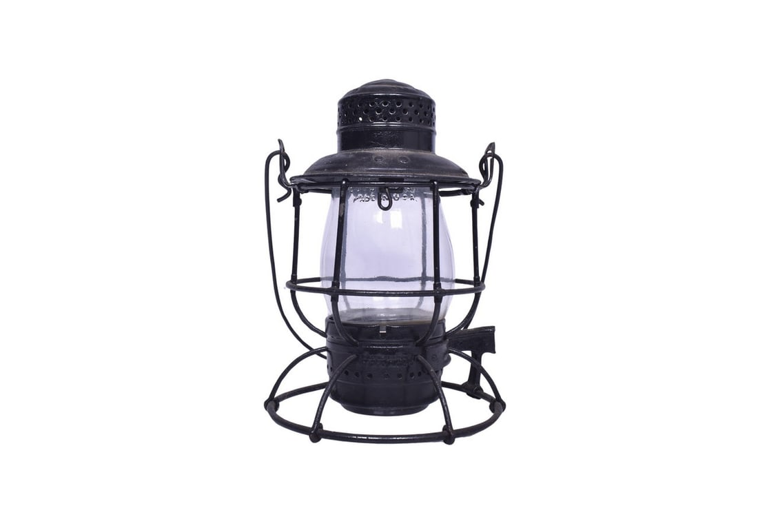 Armspear lantern with E. M. St. Ry. Co. embossed on the shoulder. Frame has a small dent in the: Armspear lantern with E. M. St. Ry. Co. embossed on the shoulder. Frame has a small dent in the chimney top, a roughly 1/2" hole cut into the bottom, and a broken off wall mount bracket. Lantern does 