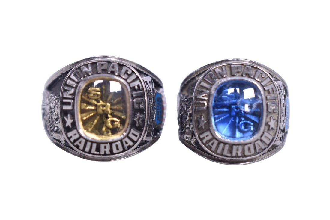 Two JLS brand men's railroad service rings, one with a yellow stone and one with a blue stone, both (1 of 7)