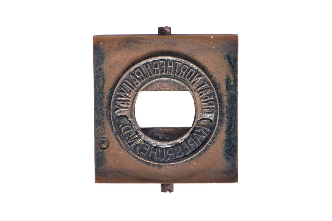 Great Northern Railway Karlsruhe, North Dakota Ticket Dater Die. Stamps "Great Northern Railway: Great Northern Railway Karlsruhe, North Dakota Ticket Dater Die. Stamps "Great Northern Railway Karlsruhe, N.D." Die is in good condition showing general wear with some ink residue. See photos for bes