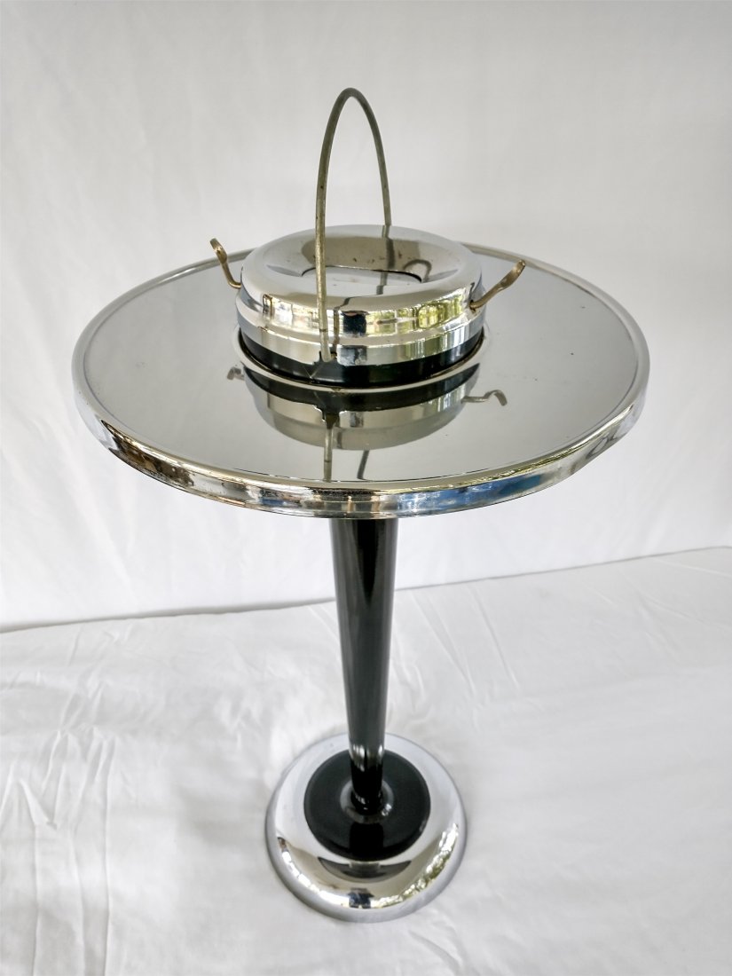 Mid Century Smoking Stand Chrome & Black: Lot 0037 Details Vintage Mid Century Modern Smoking Stand in Chrome & Black enamel. Retro Modern style has lever to depress ashes into hidden compartment. Height 25 inches x 14 inches Diameter. Very G