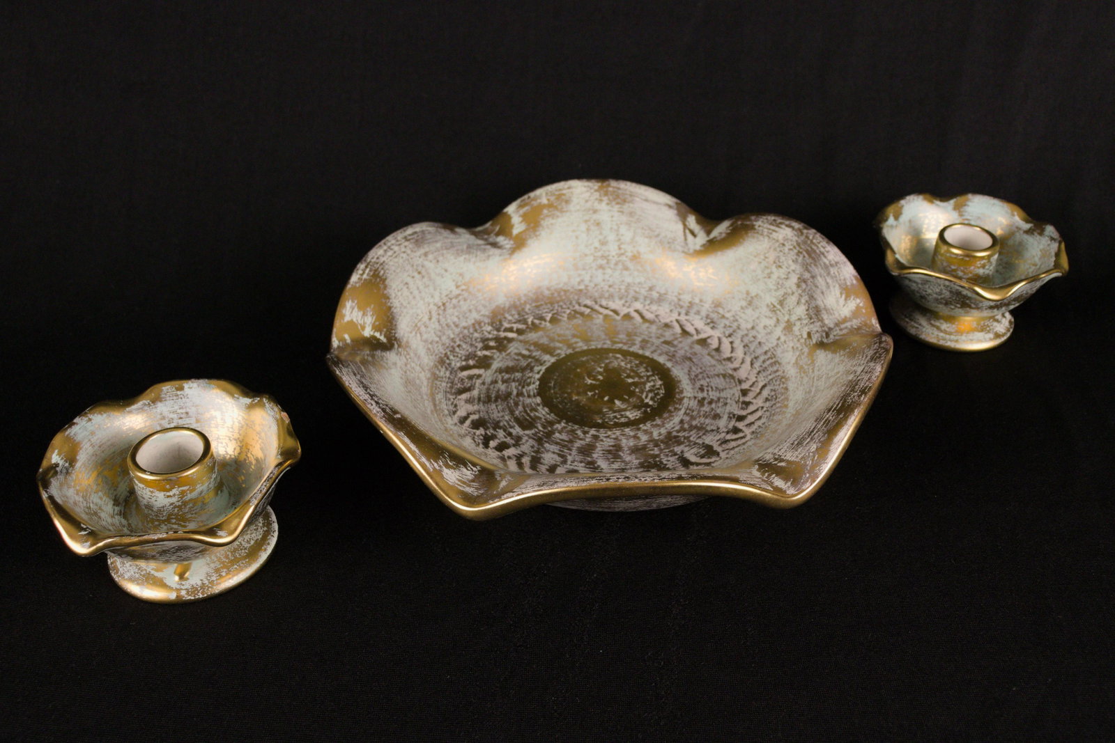 Mid Century Stangl Pottery Trio: Mid Century Stangl Pottery Trio consists of centerpiece bowl with two matching candle holders.Stangl Pottery, Trenton, NJ has a long related history with Fulper Pottery. Fulper began in 1899. A short 