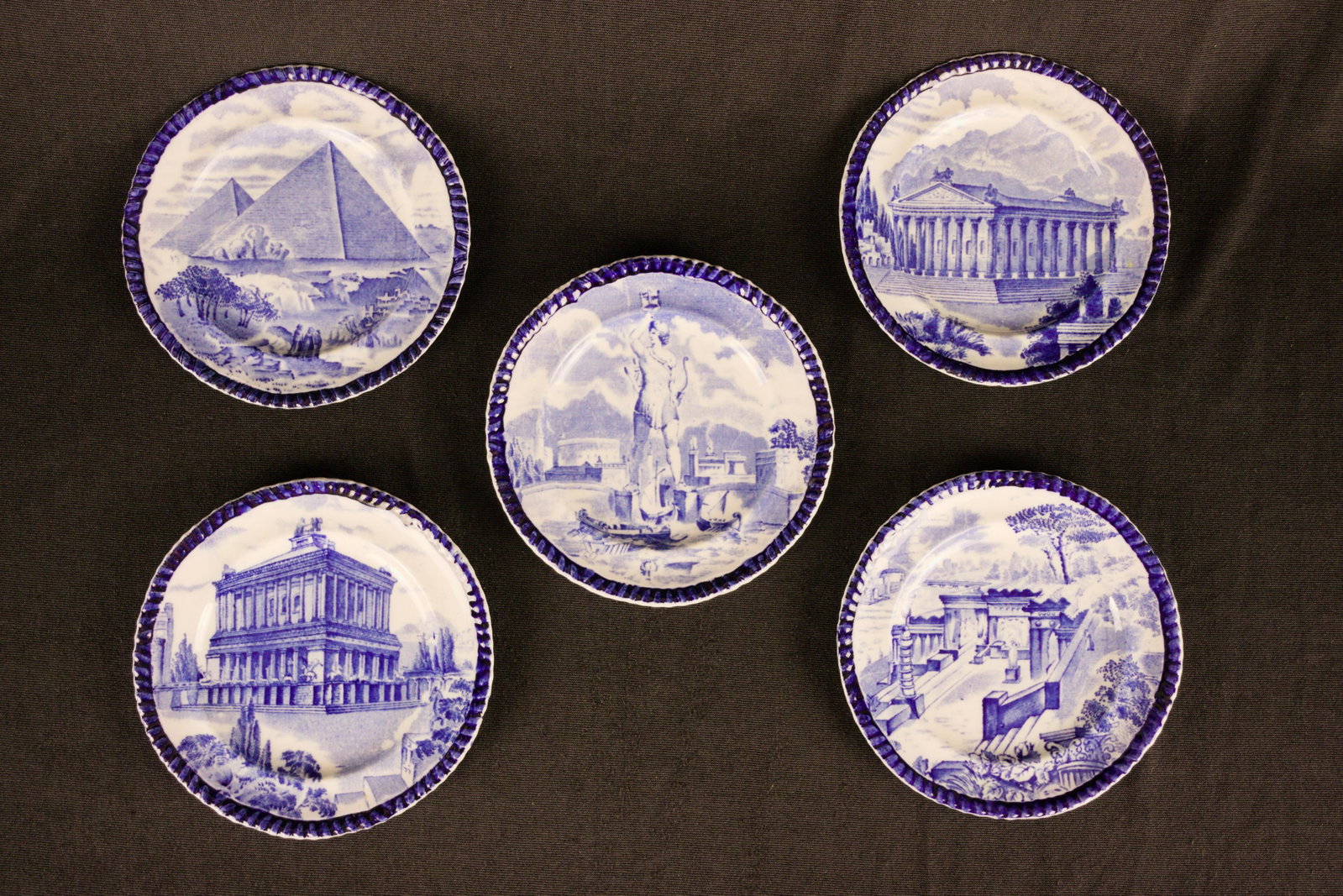 19Th C. Copeland Grand Tour Plates: In 1898, W.T. Copeland & Sons produced a series on porcelain titled Seven Wonders of the World. Offered here are 5 of these Wonders, depicted on blue & white plates, that the Victorians adored as both