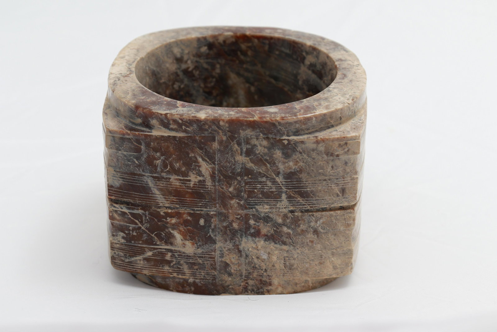 CHINA, LUONG CHU CULTURE: Stone ringLiangzhu Culture, 2900 - 2500 B.C.9 x 9 cmCondition: In good overall condition