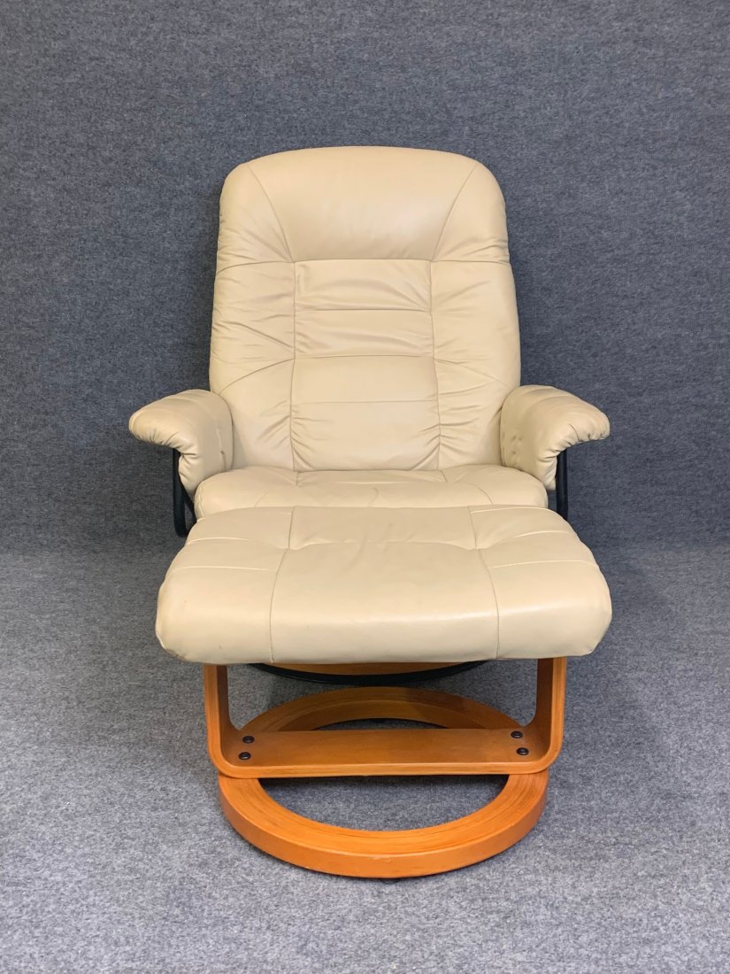 Leather Chair and Ottoman: Chair reclines. Chair: 38.5"h x 31.5"w x 25"d, seat height 14.25". Ottoman: 14.25"h x 21.75"w x 19"d