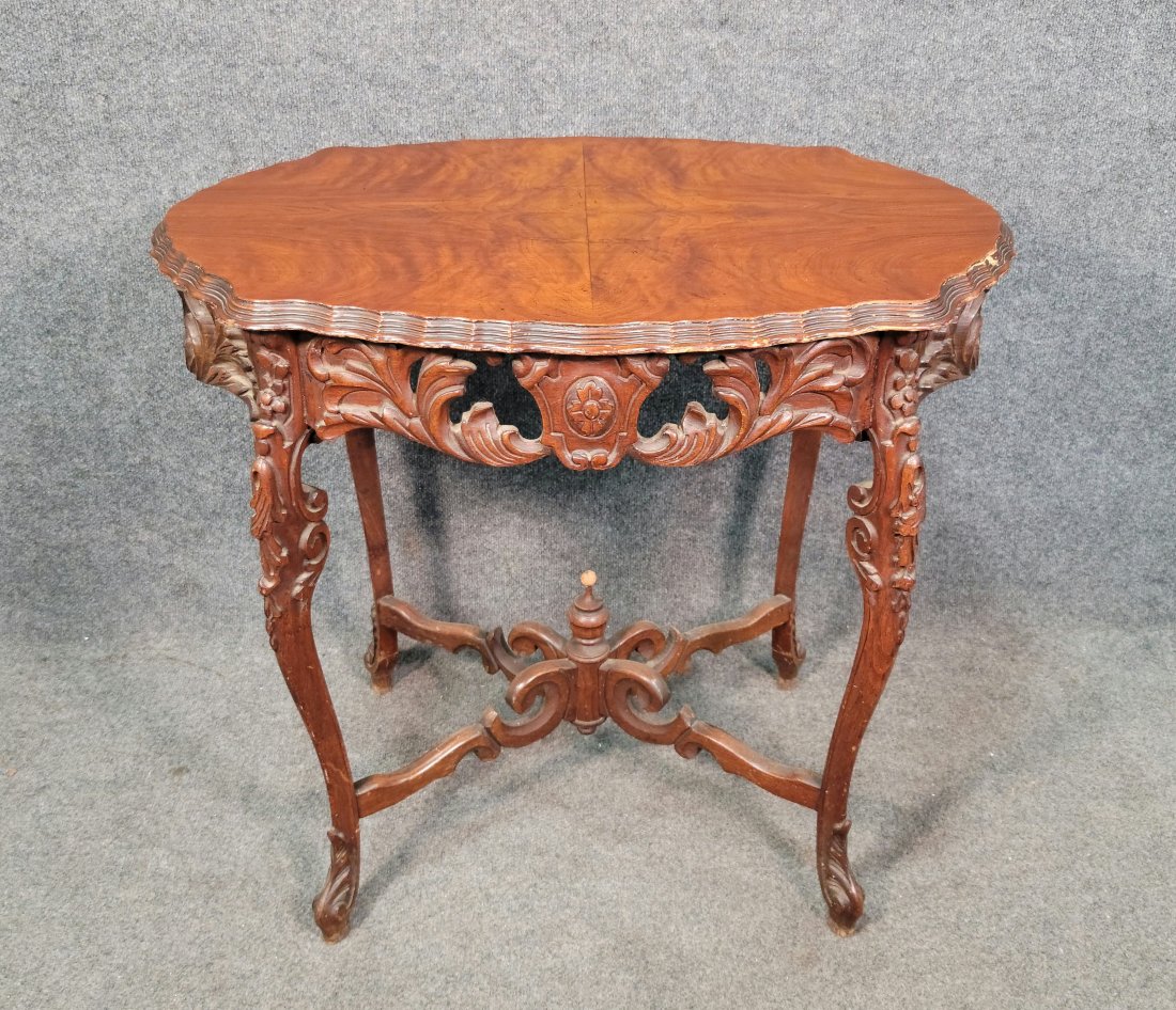 Carved Center Table: 28.50"H, 32"W, 22"D