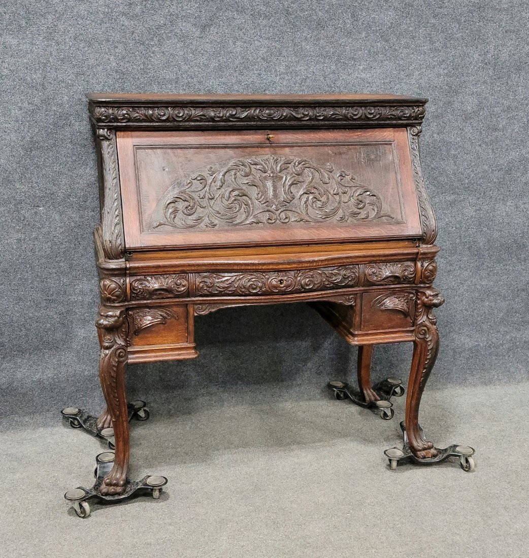 Oak Carved Horner Desk: 45.25"H, 42"W, 20.50"D