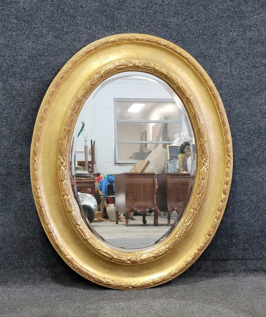 Gold Leaf Mirror: 38.50"H, 30.75"W