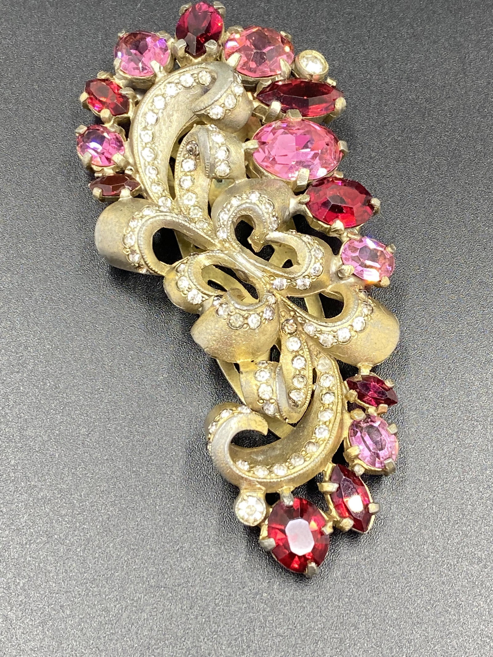 Eisenberg Original Fur Clip with faceted crystals: Eisenberg Original Giant Brooch. For exact dimensions please refer to the attached dimensions sheet. Marked Eisenberg Original. The Eisenberg company has made jewelry for over eight decades, from the 