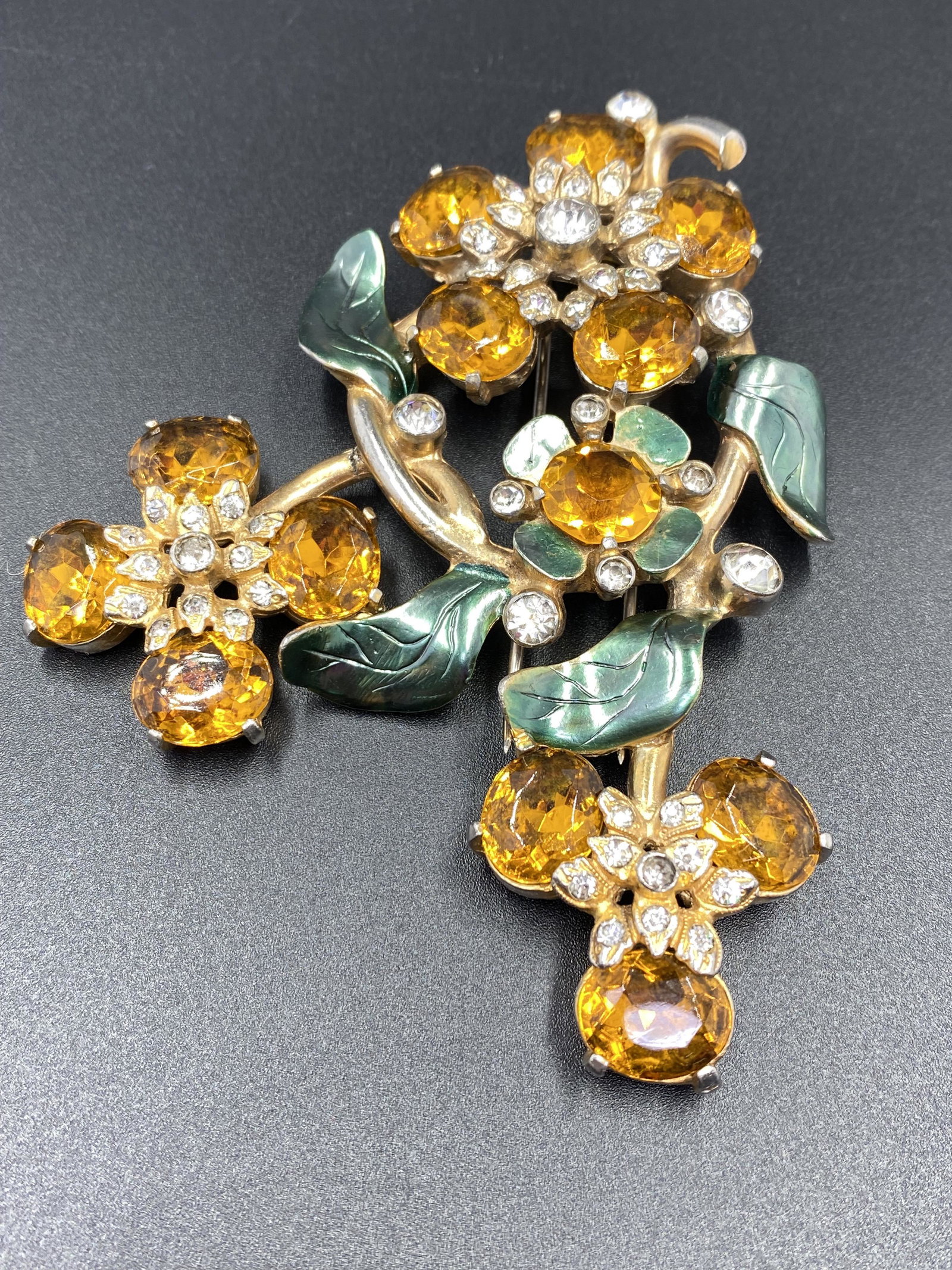 Eisenberg Original Fur Clip with faceted crystals: Eisenberg Original Giant Brooch. For exact dimensions please refer to the attached dimensions sheet. Marked Eisenberg Original. The Eisenberg company has made jewelry for over eight decades, from the 
