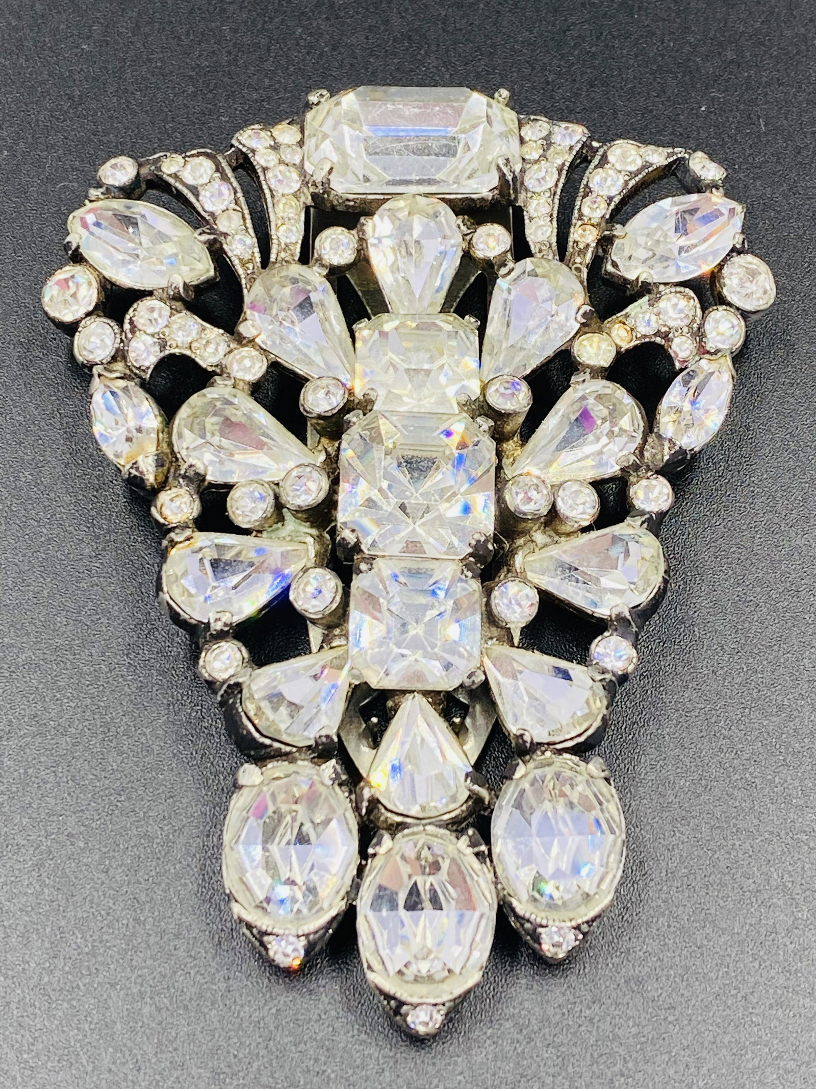 Eisenberg Original Fur Clip with faceted crystals: Eisenberg Original Giant Brooch. For exact dimensions please refer to the attached dimensions sheet. Marked Eisenberg Original. The Eisenberg company has made jewelry for over eight decades, from the 