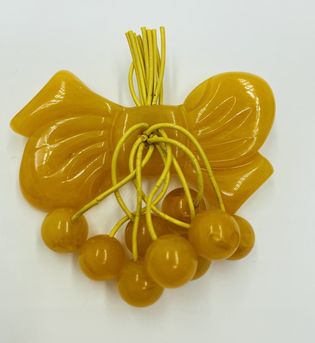 Bakelite Butterscotch Bow Brooch with Dangling Cherries (1 of 3)