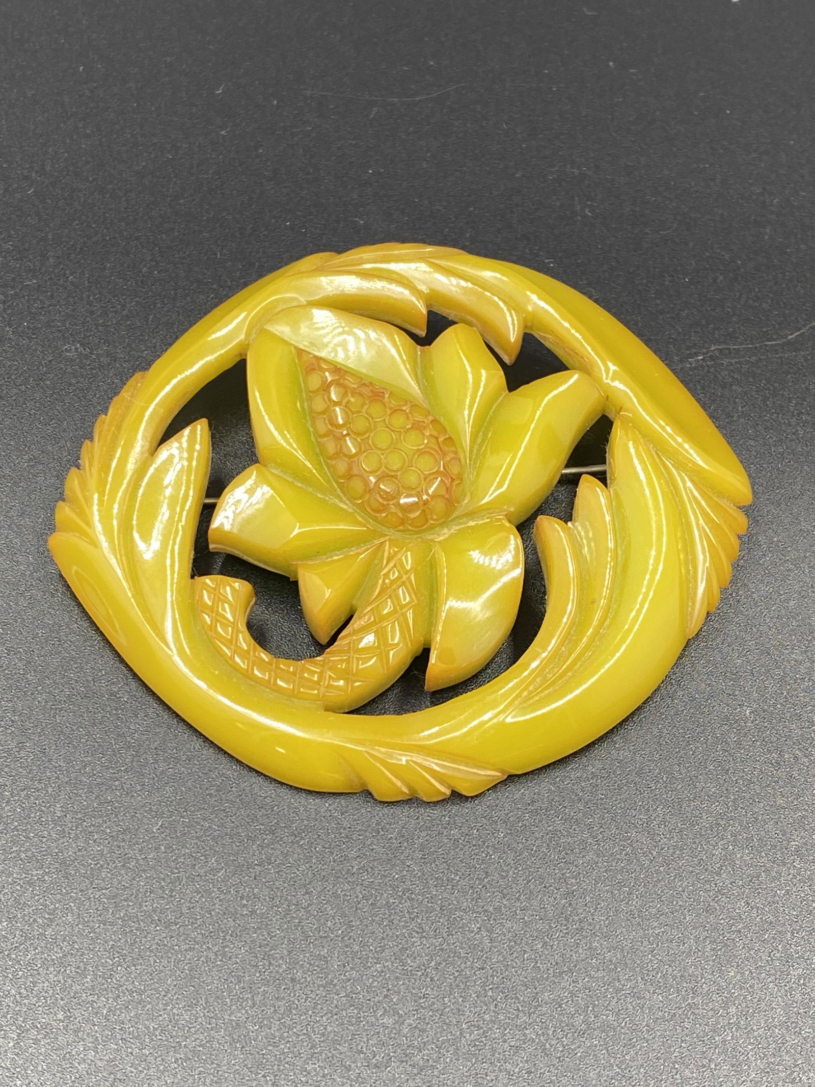 Vintage Carved Olive Green Bakelite Flower Brooch (1 of 3)
