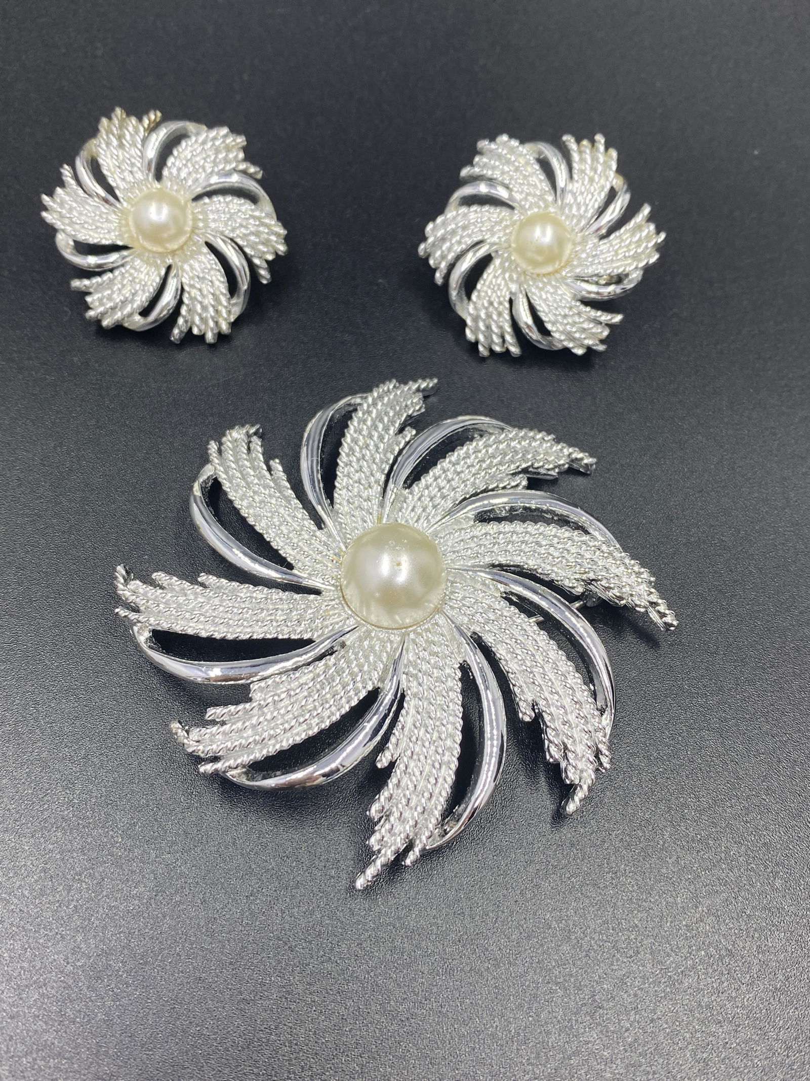 Sarah Coventry Brooch and Earrings: For exact dimensions please refer to the attached dimensions sheet. Marked SarahCov.Founded in 1949 by Charles Stuart, Sarah Coventry was named via the combination of his granddaughterâ€™s first