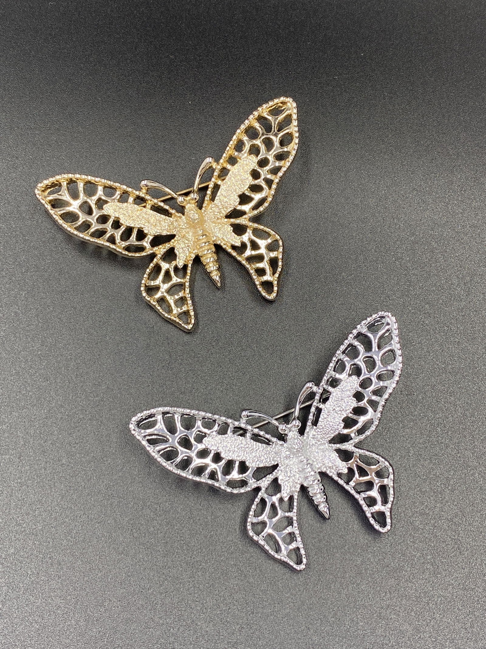 Two Sarah Coventry Brooches: For exact dimensions please refer to the attached dimensions sheet. Marked SarahCov.Founded in 1949 by Charles Stuart, Sarah Coventry was named via the combination of his granddaughterâ€™s first