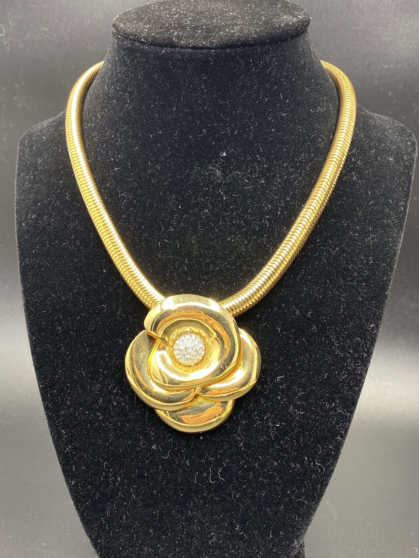 Vintage Rose Necklace from the Masterpiece Collection: Necklace: Marked Trifari. The Dimensions are: Necklace: 15 inches . The necklace appeared in the 1977 Trafari Ad under TRIFARI is one of the brightest stars of all the costume jewelry makers, beginnin
