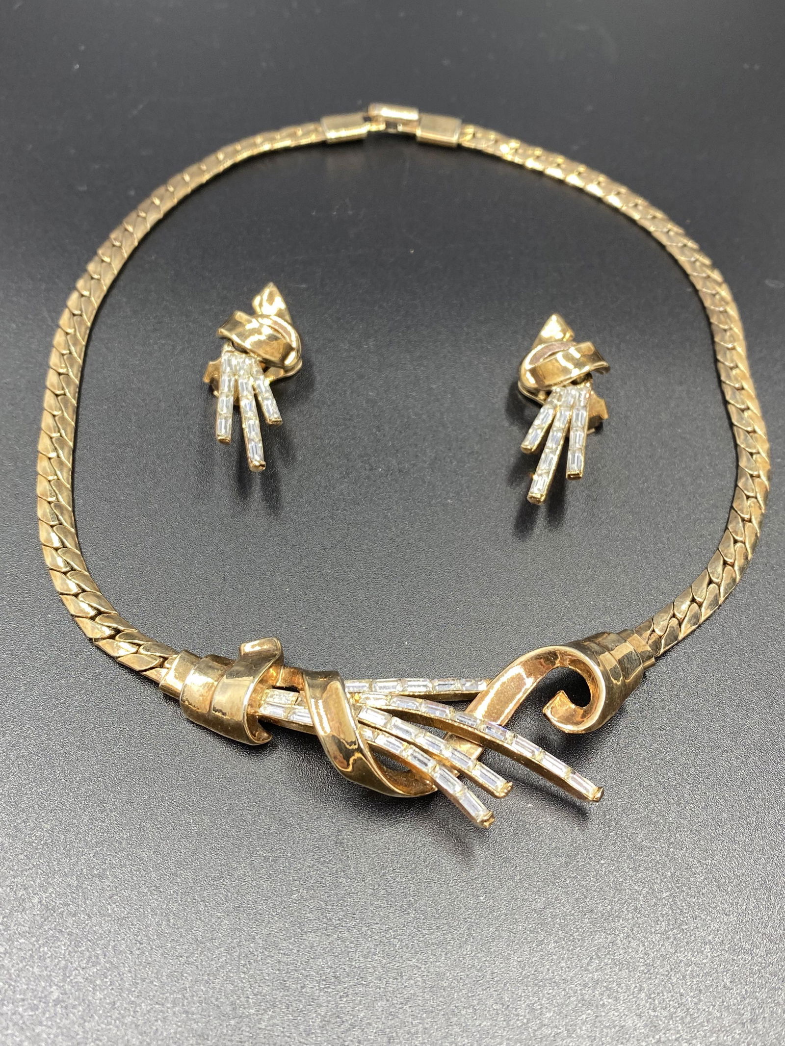 Trifari Alfred Philippe Meteor Necklace and Earrings: For exact dimensions please refer to the attached dimensions sheet. Marked Trifari. Featured in 1949 Ad "Meteor Collection". The Ad is provided for reference only and not include in the sale. TRIFARI