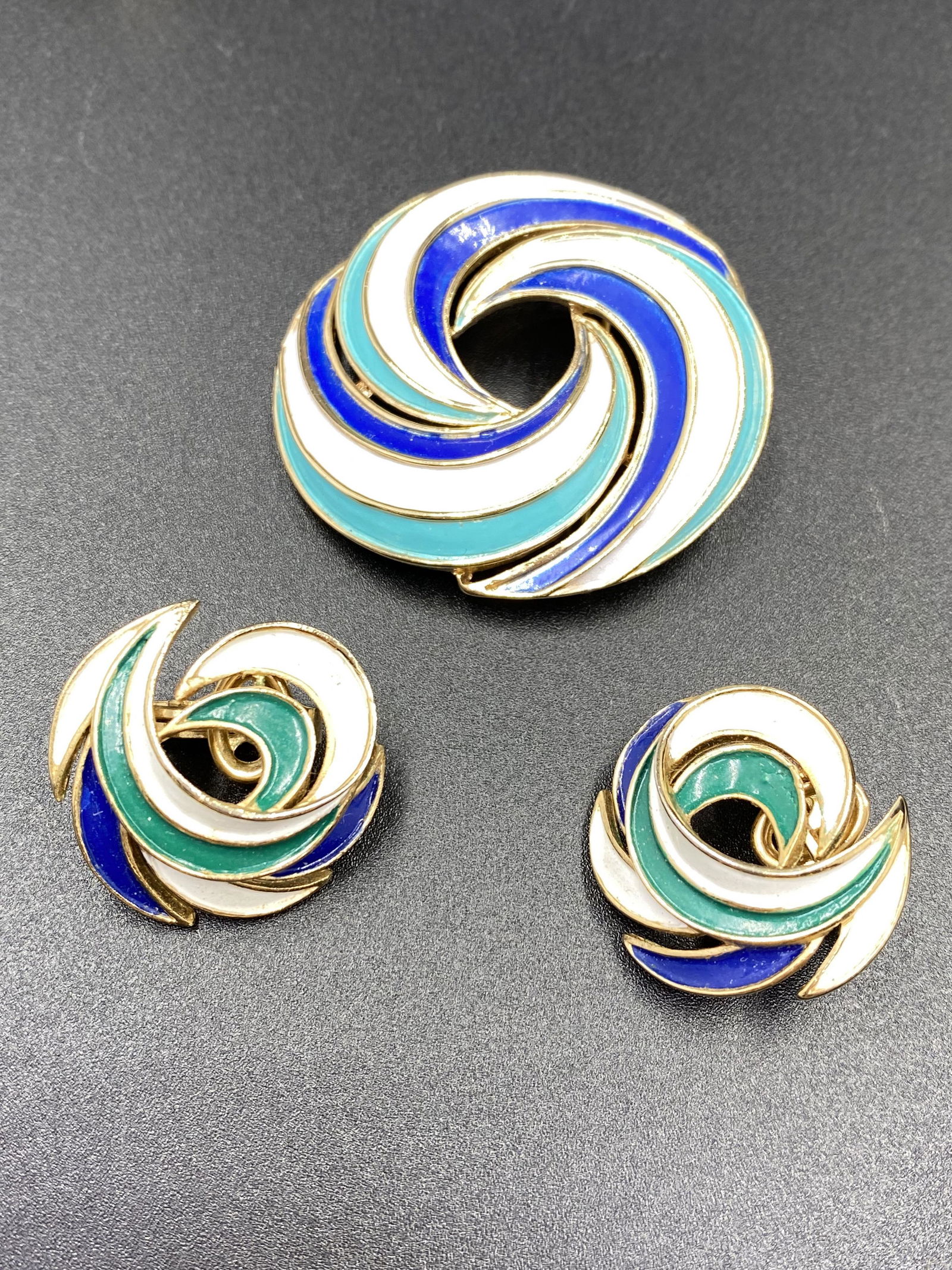 Vintage Trifari Brooch and Earrings: For exact dimensions please refer to the attached dimensions sheet. Marked TrifariTRIFARI is one of the brightest stars of all the costume jewelry makers, beginning as Trifari, Krussman & Fishel in th