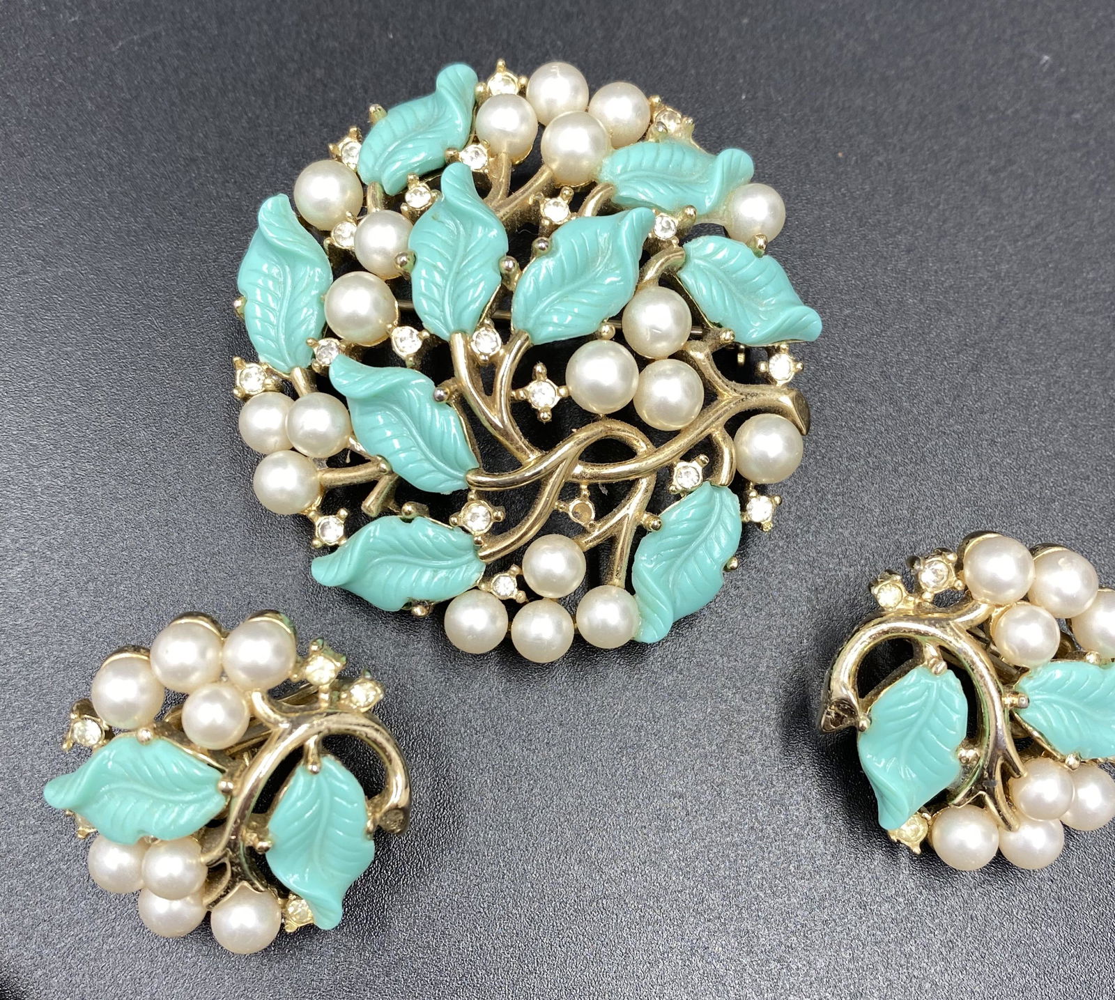 Vintage Trifari Brooch and Earrings: For exact dimensions please refer to the attached dimensions sheet. Marked TrifariTRIFARI is one of the brightest stars of all the costume jewelry makers, beginning as Trifari, Krussman & Fishel in th