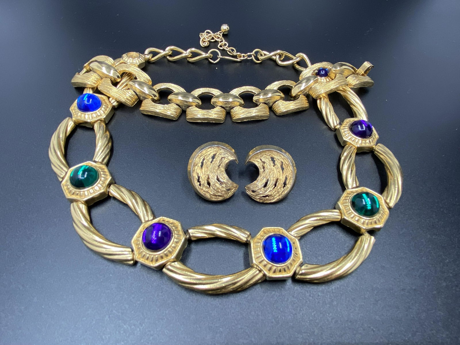1980s Signed Trifari Necklace Bracelet and Earrings: For exact dimensions please refer to the attached dimensions sheet. Marked TrifariTRIFARI is one of the brightest stars of all the costume jewelry makers, beginning as Trifari, Krussman & Fishel in th