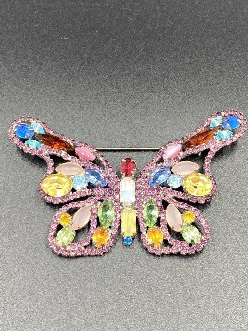 Kenneth Jay Lane KJL Butterfly Brooch: Marked KJL. For exact dimensions please refer to the attached dimensions sheet. Innovative, gifted, and imaginative, Kenneth Jay Lane's exceptional skill has ensured him a permanent place in fashion h