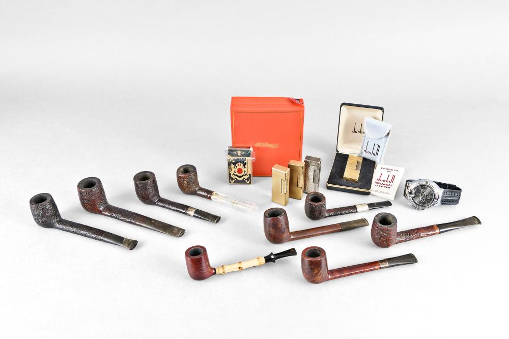 Collection of tobacco pipes, lighters, and mechanical (1 of 3)