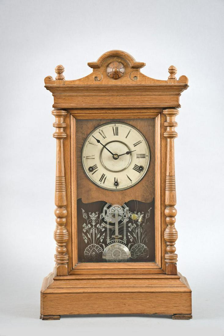 Seth Thomas Clock Co. "Atlas" Shelf Clock: Seth Thomas Clock Co., Thomaston, Conn., "Atlas" shelf clock, oak, painted metal dial, steel hands, 8 day, spring driven quarter hour strike on two cup bells and hour strike on cathedral gong. Details