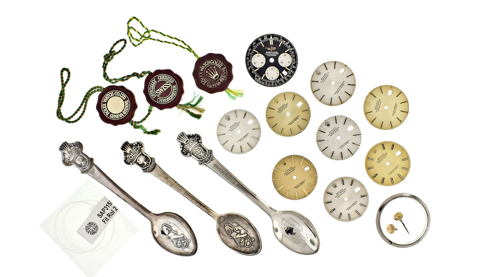 Eight Rolex Datejust dials: Lot of eight Rolex Datejust dials, two silver sunburst, three champagne sunburst, two silver linen, and one gold linen, all 28mm, together with two sapphire cyclops crystals, three Rolex tags, three R