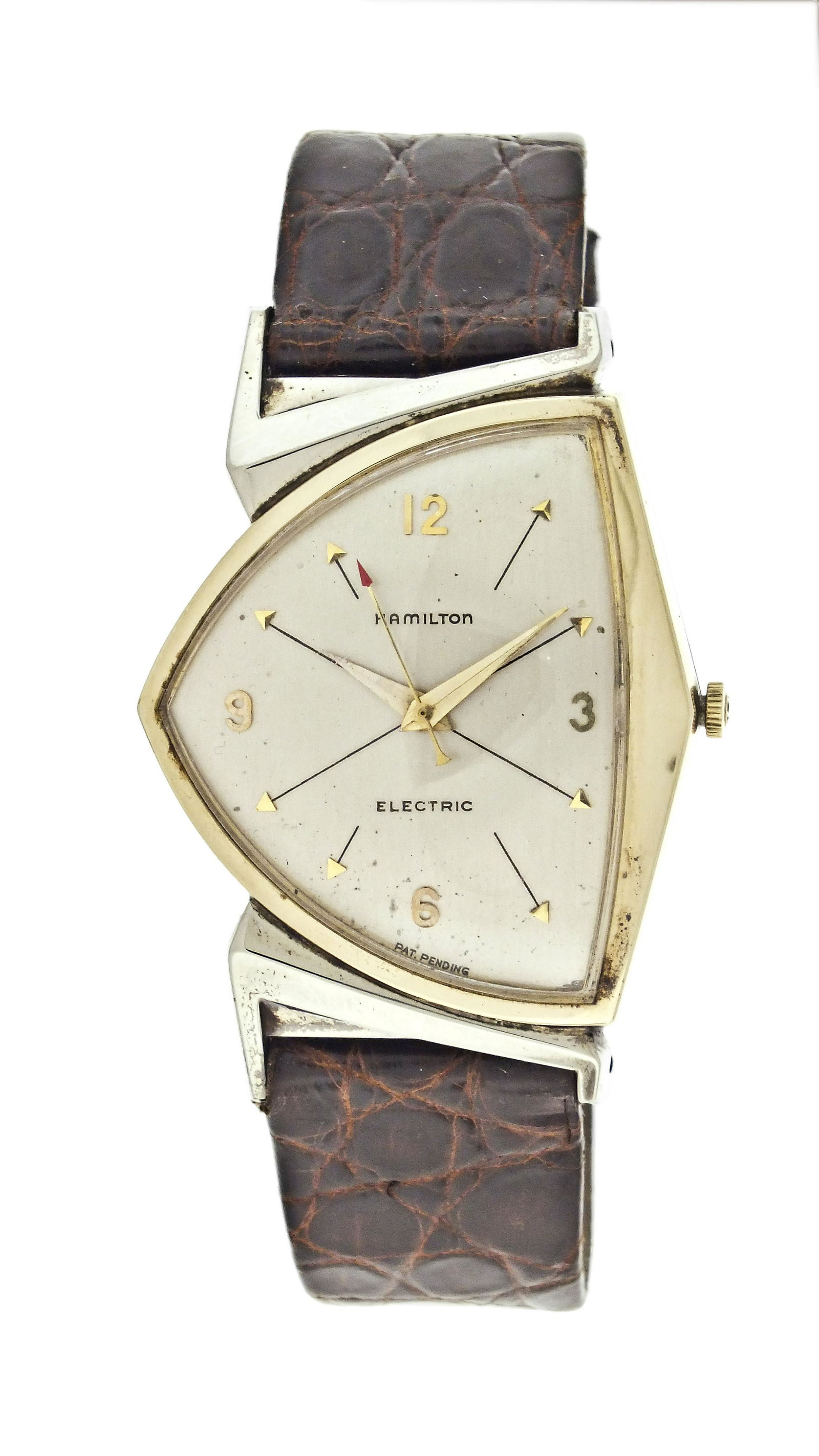 A Hamilton electric "Pacer" model wrist watch: Hamilton Watch Co., Lancaster, Penn., an electric "Pacer" wrist watch, 11 jewel, caliber 500 battery powered nickel plate movement, in a white and yellow gold filled asymmetric case, arabic numeral an