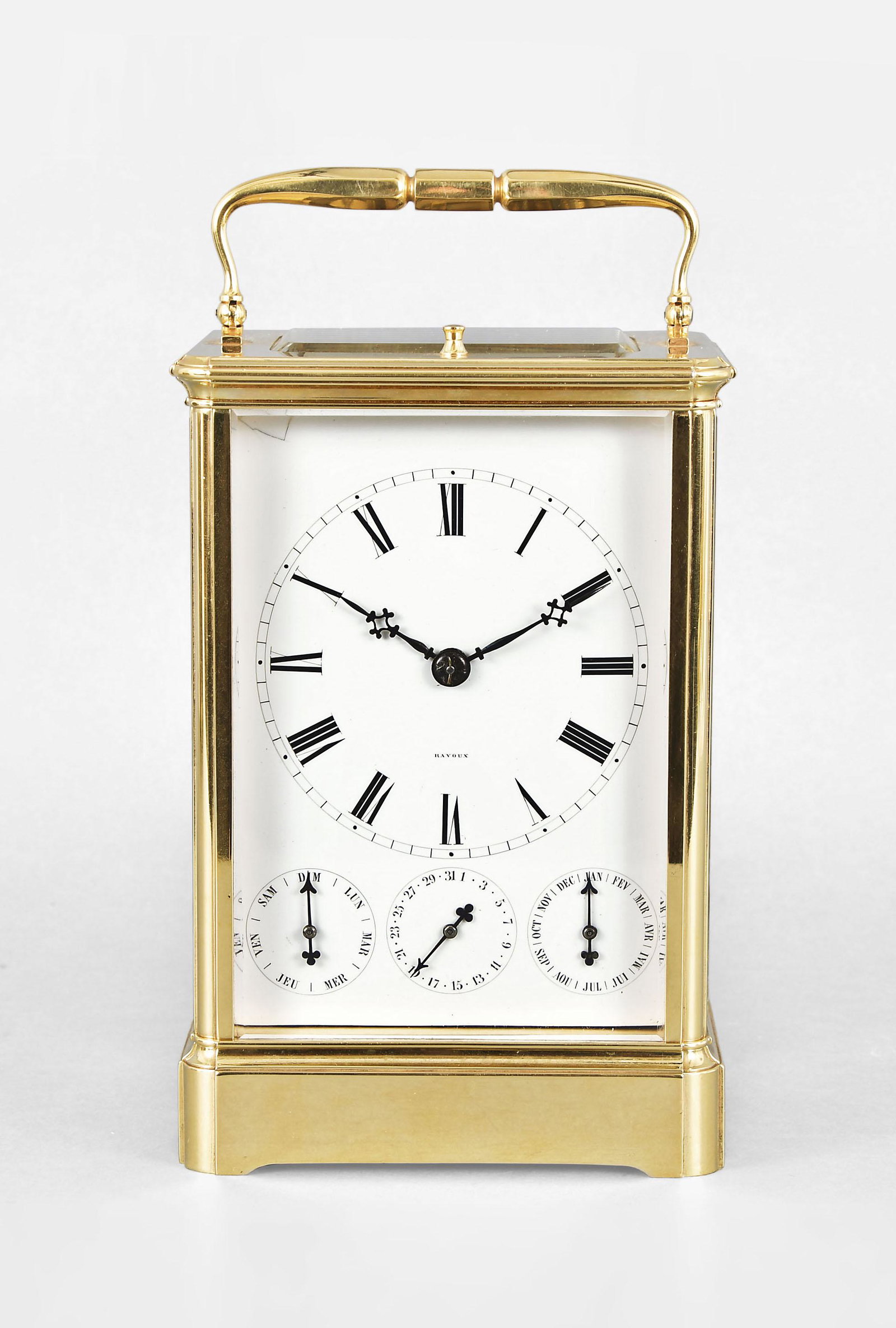 An unusual petit sonnerie striking giant carriage clock: J.C. Ravoux, an unusual petit sonnerie striking giant carriage clock with calendar, the gilt case with five bevelled glasses and folding handle, signed roman numeral white enamel dial with subsidiary 