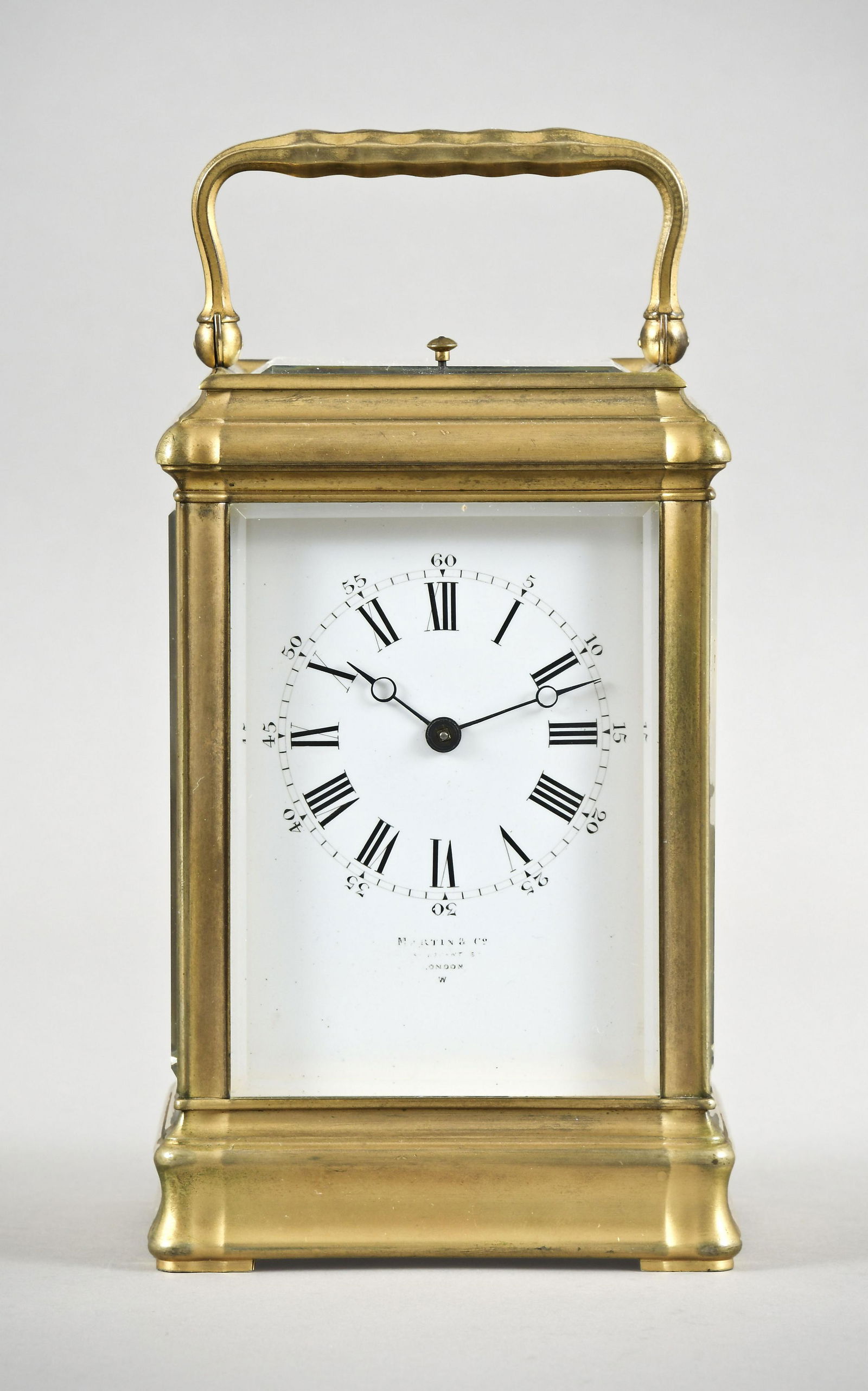 A French grand sonnerie carriage clock signed Margaine: Margaine, France, for Martin & Co., London, a grand sonnerie repeating carriage clock with outer case, the gilt, Gorge case with five bevelled glasses, roman numeral white enamel dial with blued steel