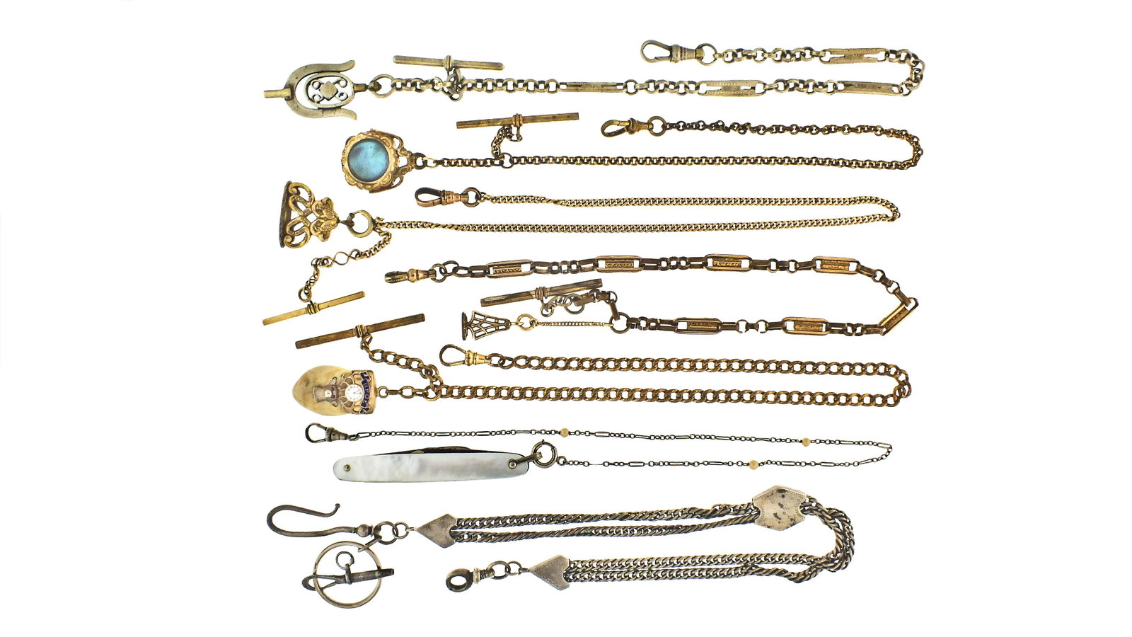 Lot of fourteen watch chains: 14 (Fourteen) watch chains, gold filled, steel, silver and German silver, including seven single Albert style chains, one with enameled Odd Fellows fob, another with enameled Elks tooth fob, others wi