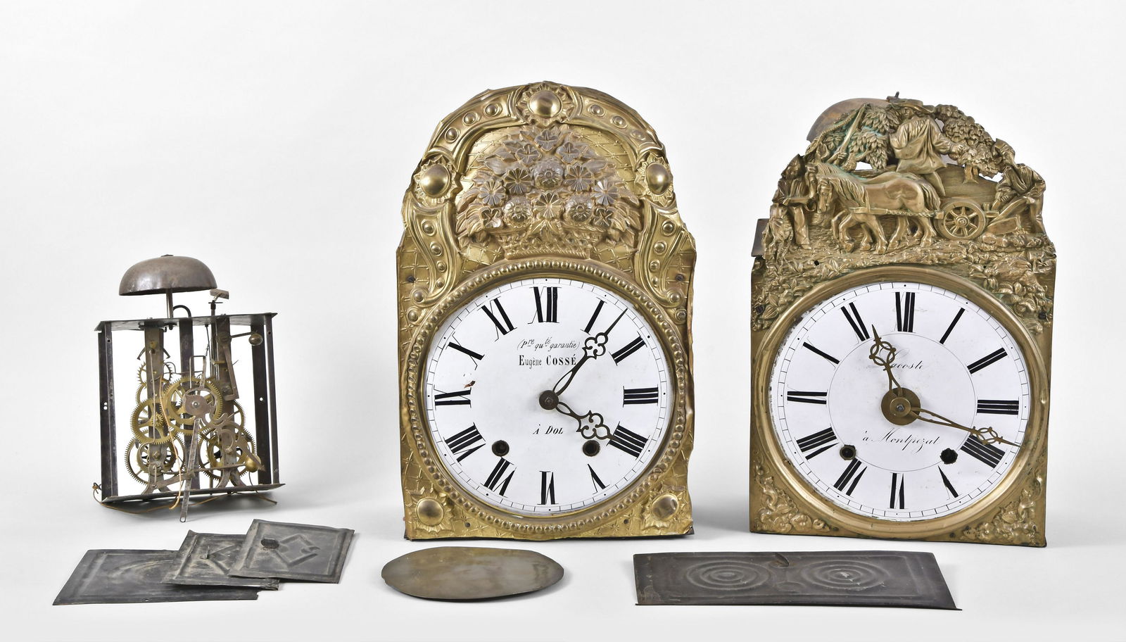 Three Morbier Clock Movements: 3 (Three) French Morbier clock movements, two with dials and hands, including one signed Lacoste a Montpezat and the other signed Eugene Cosse a Dol
