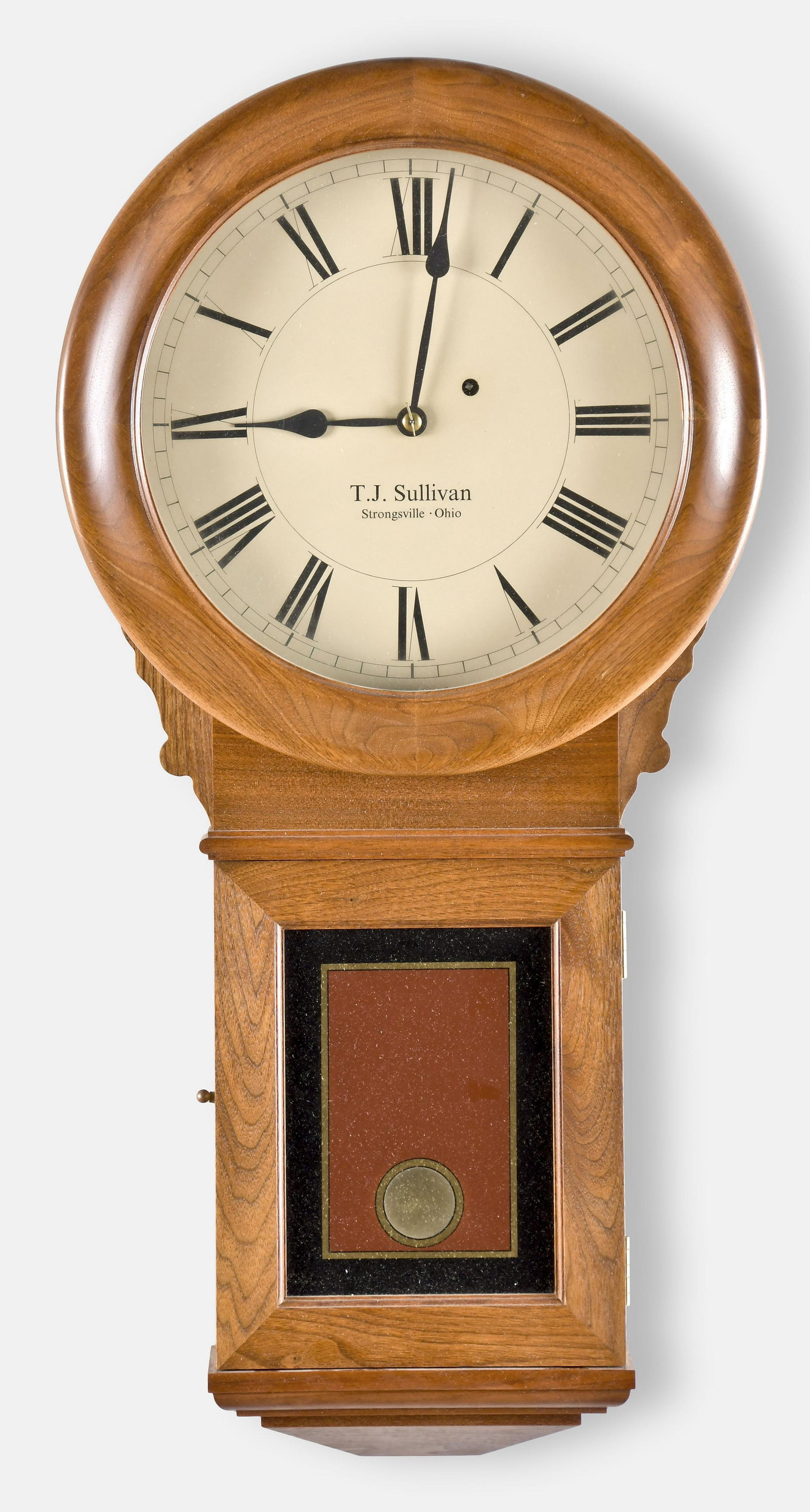 Reproduction of E. Howard Model 70 wall clock: T.J. Sullivan, Strongsville, Ohio, reproduction of an E. Howard & Co. "No. 70 Regulator" wall clock, walnut case with reverse painted tablet, painted metal dial, spade steel hands, 8 day time only wei