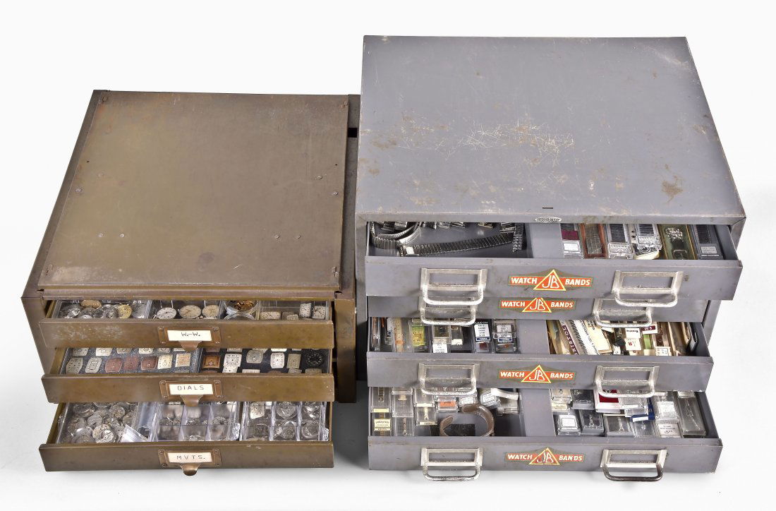 A lot of two metal cabinets containg wrist watch cases movements and watch bands (1 of 2)