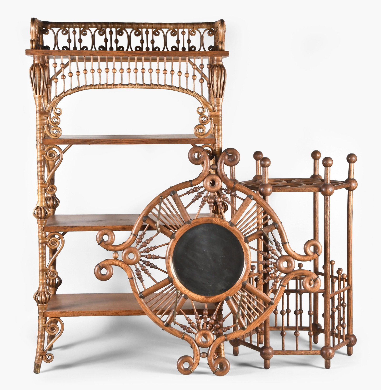 Three pieces of oak stick and ball and bentwood furniture: 3 (Three) pieces of oak stick and ball and bentwood furniture, the first an umbrella stand, the hexagonal frame with provision for seven umbrellas, ball finials, and base with stick and ball balustrad