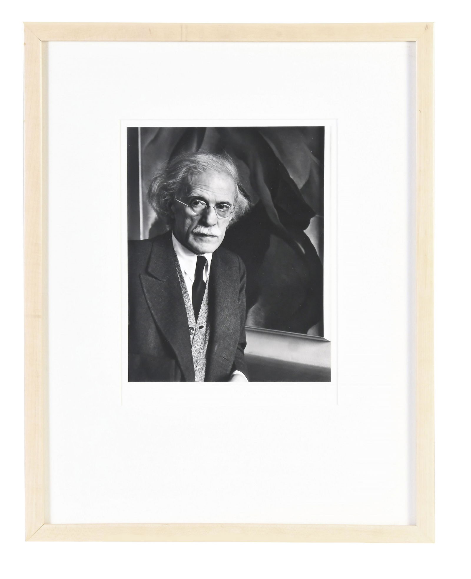 Portrait of Alfred Stieglitz silver print by Imogen Cunningham: Imogen Cunnigham, "Stieglitz at American Place 1934", gelatin silver print, matted and framed, the artist's facsimile signature and chop impressed in mount at lower right, print dimensions 7.25 in x 9