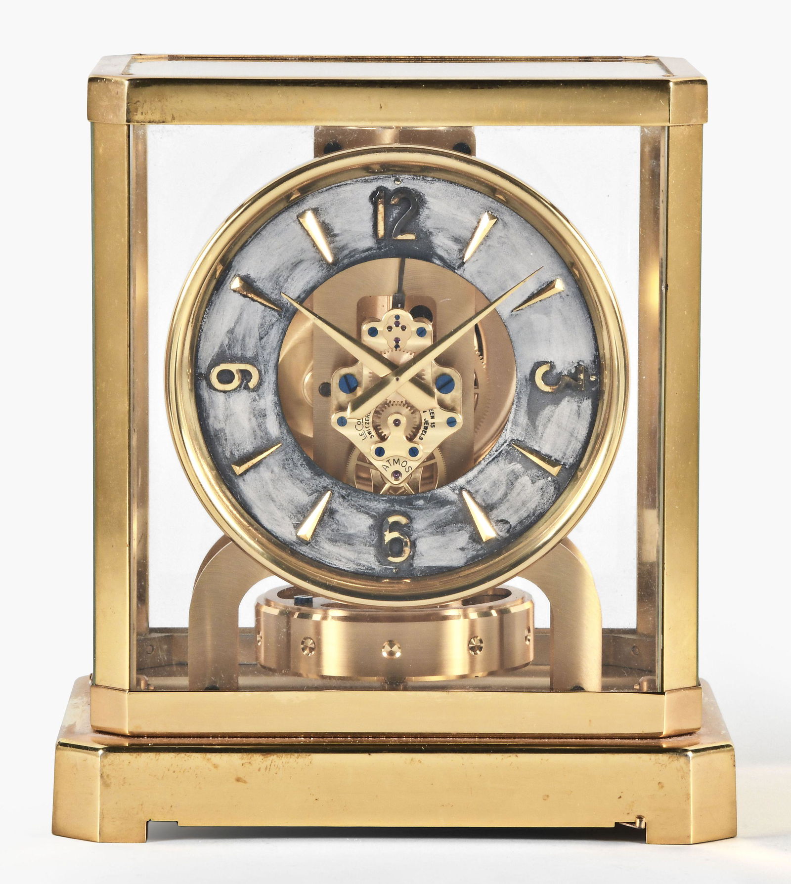 LeCoultre Atmos mantel clock: Jaeger LeCoultre, Switzerland, "Atmos" cal. 519 mantel clock, polished brass case, modern style hands, perpetual movement regulated by a torsion pendulum, serial #27719