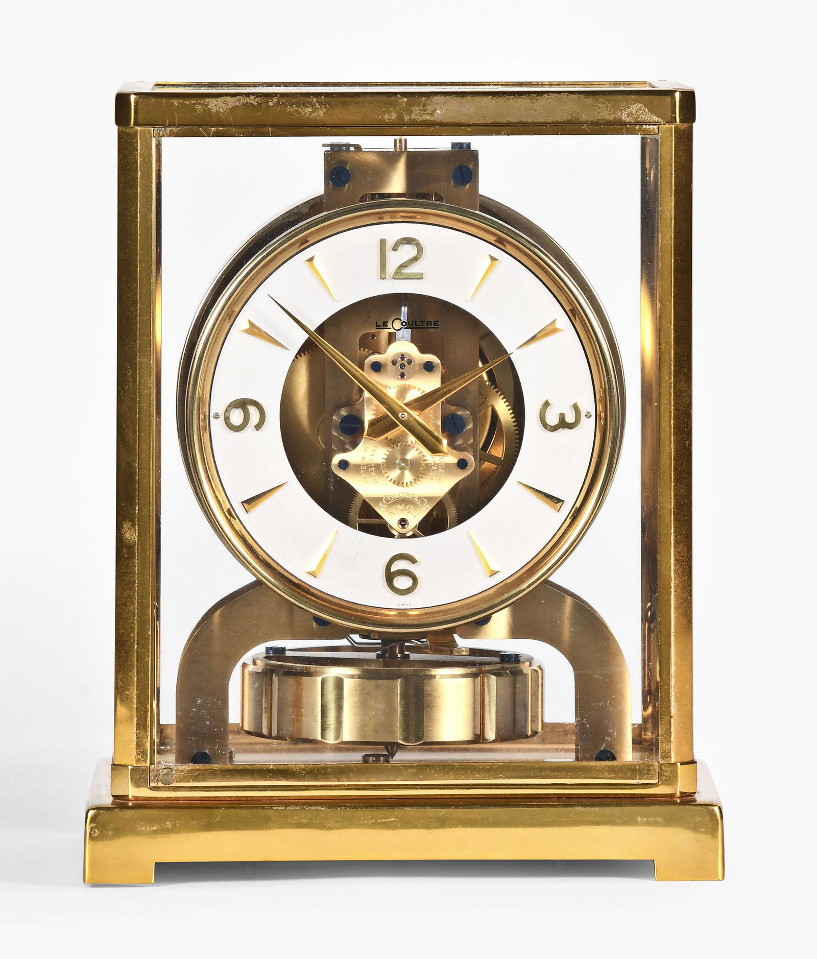 Jaeger LeCoultre Atmos mantel clock: Jaeger LeCoultre, Switzerland, "Model 526-5", Atmos mantel clock, polished brass case, painted brass dial, modern style hands, perpetual movement regulated by a torsion pendulum, serial #76676