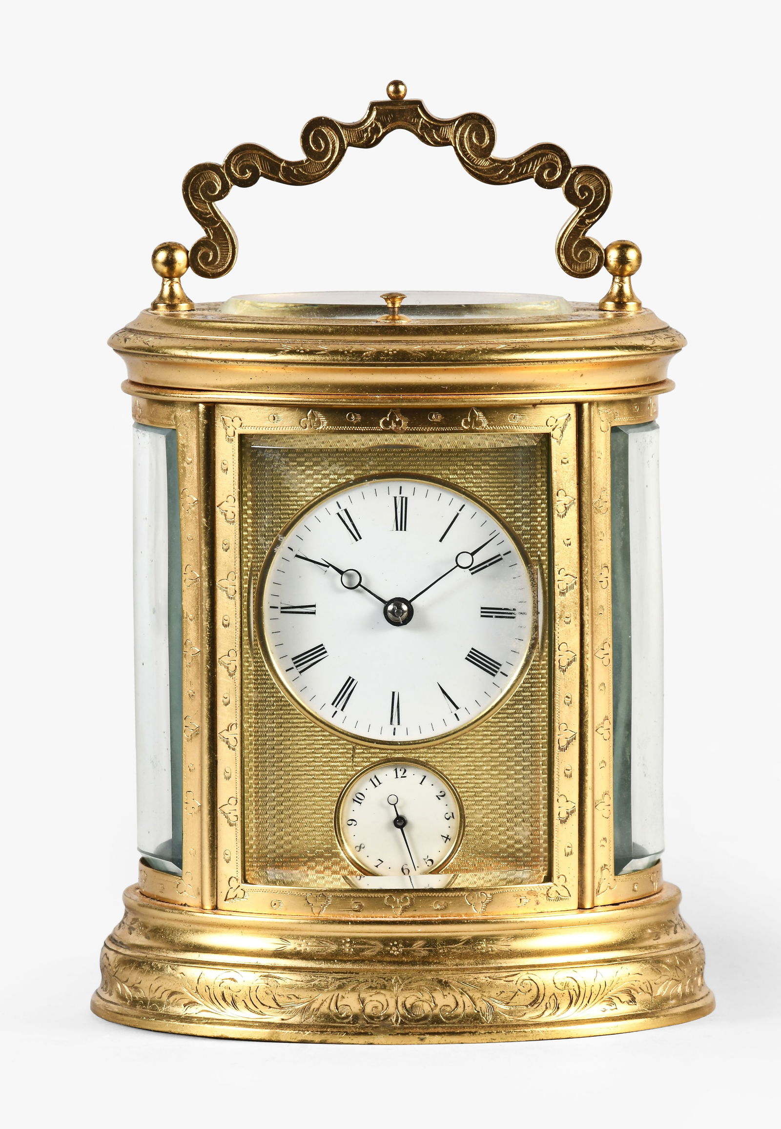 A third quarter 19th century French engraved oval repeating carriage clock (1 of 8)