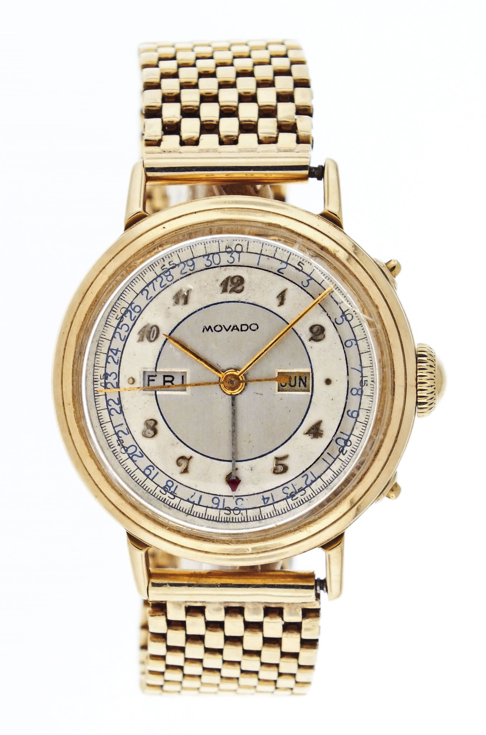 A mid 20th century gold Movado Calendomatic wrist watch: Movado, Switzerland, a mid 20th century ref. 44819 "Calendomatic" wrist watch, 15 jewels, manual winding, rhodium plated cal. 470 movement with lever escapement in a 14 karat yellow gold case with 14